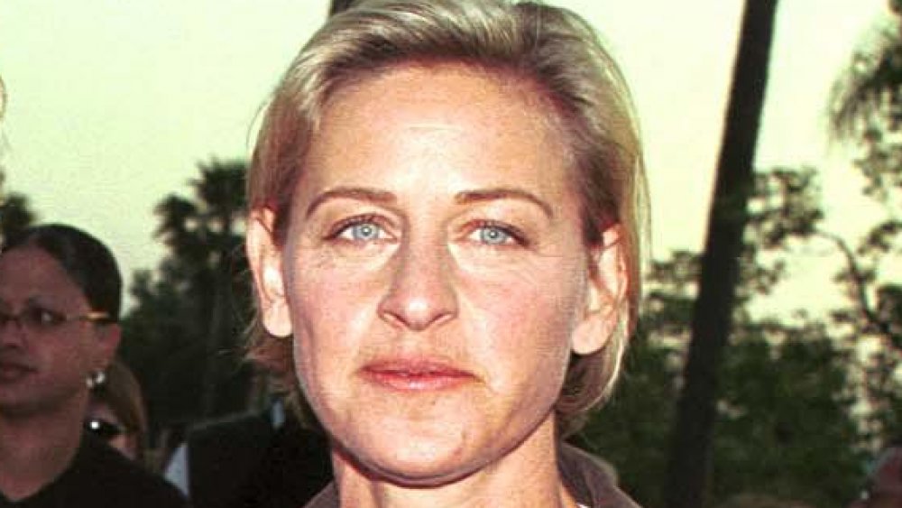 Ellen DeGeneres posing at a movie premiere in the late '90s