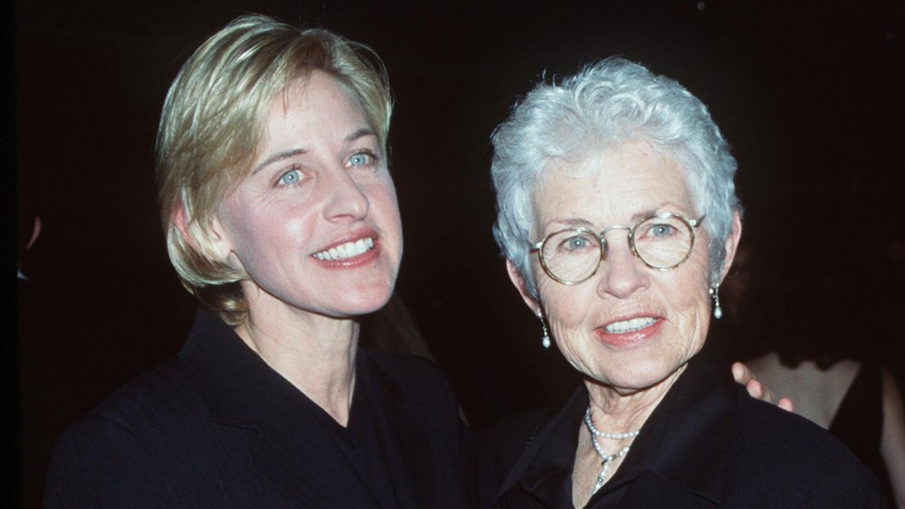 Ellen DeGeneres and Betty DeGeneres posing together and smiling in the late '90s