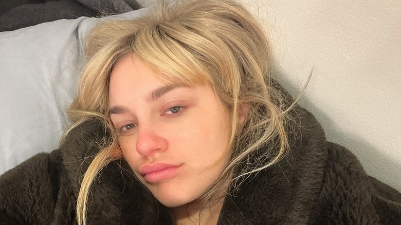 Gracie McGraw takes selfie lying down