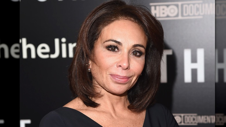 Jeanine Pirro posing at a red carpet event