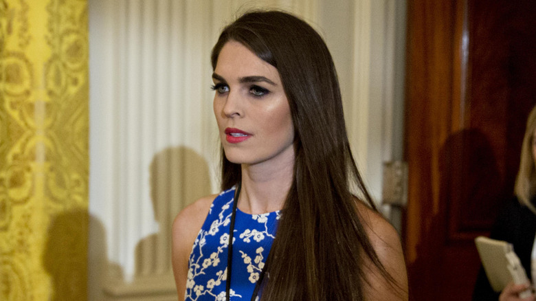 Hope Hicks walking past