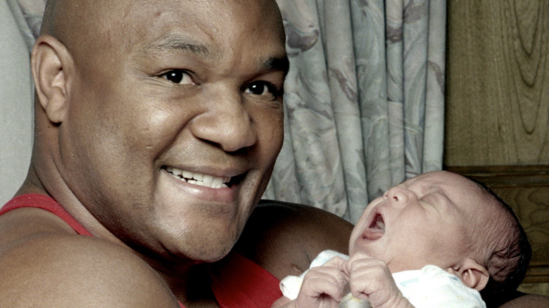 George Foreman and son George III as a baby