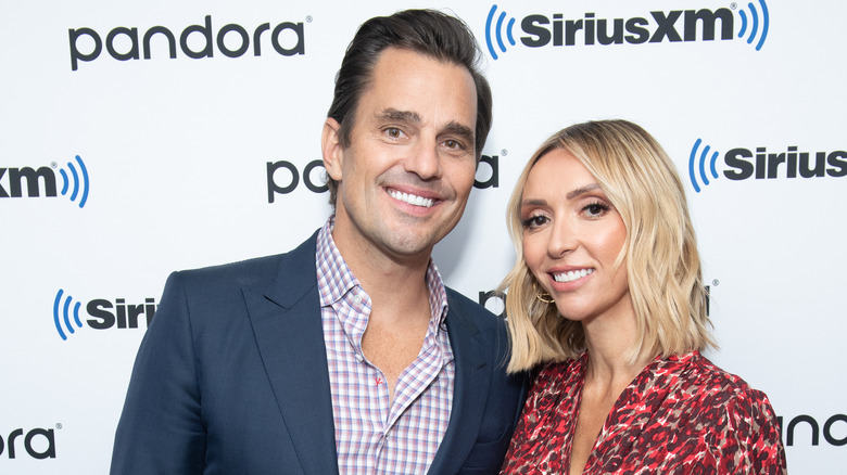 Bill and Giuliana Rancic posing at an event