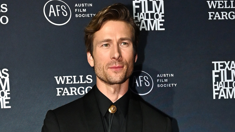 Glen Powell wearing bolo tie