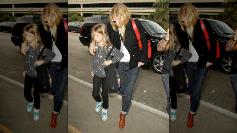 Gwyneth Paltrow walking with young Apple Martin