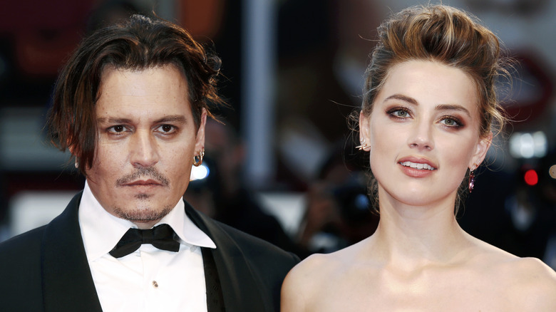 Johnny Depp and Amber Heard posing together