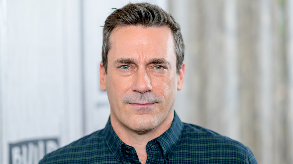 Jon Hamm with a slight smile 