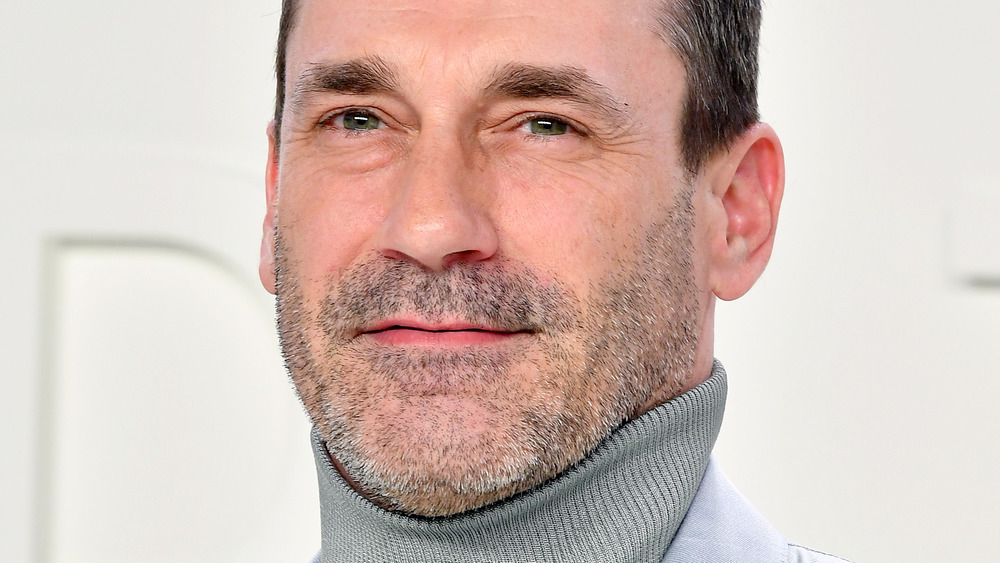 Jon Hamm with a slight smile 