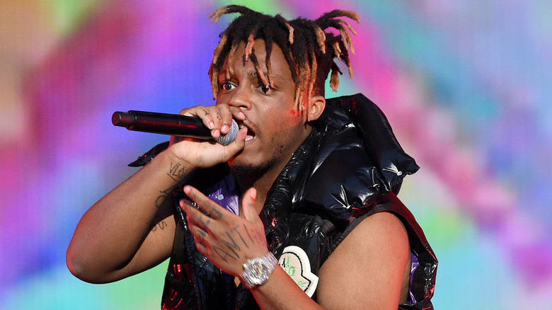 Juice WRLD facing camera yellow jacket
