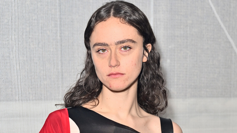 Ella Emhoff poses with serious expression and long hair