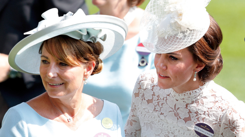 Carole and Kate Middleton wearing white