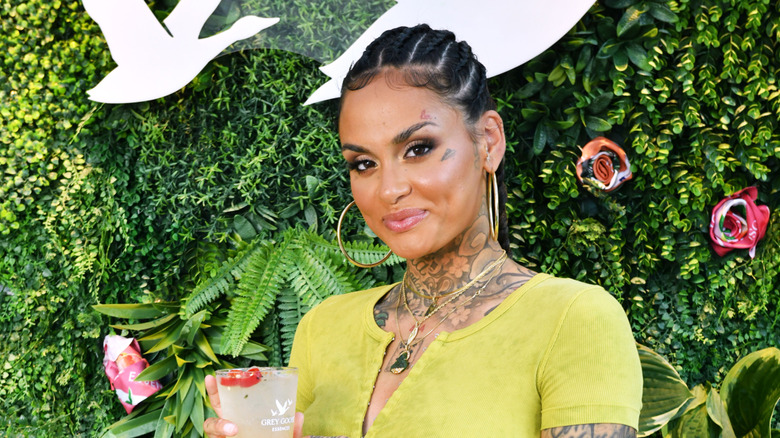 Kehlani in hoop earrings