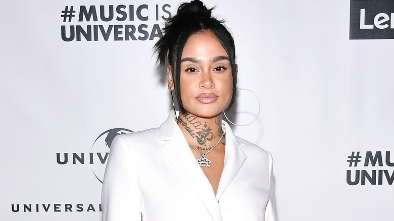 Kehlani in white suit