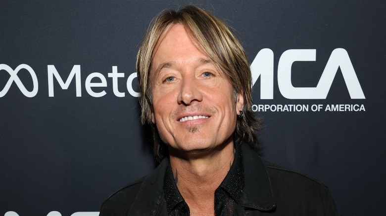 Keith Urban smiling on the red carpet