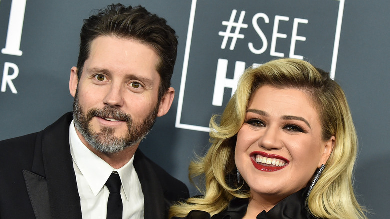 Brandon Blackstock and Kelly Clarkson smiling
