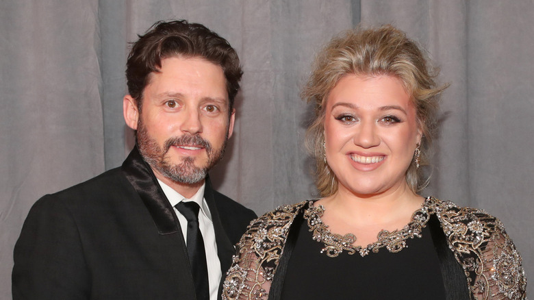 Brandon Blackstock and Kelly Clarkson posing together in 2018