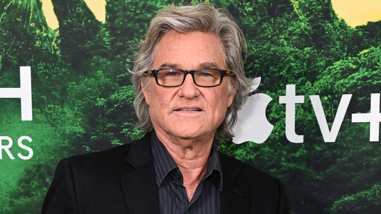Kurt Russell posing at the 
