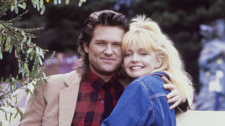 Kurt Russell and Goldie Hawn pose in the '80s