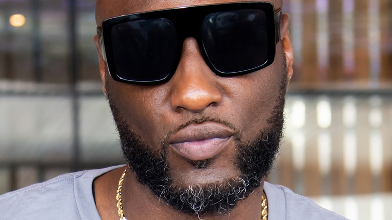 Lamar Odom wearing dark glasses