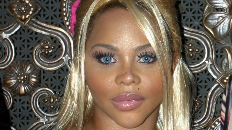 Lil' Kim with blue eyes