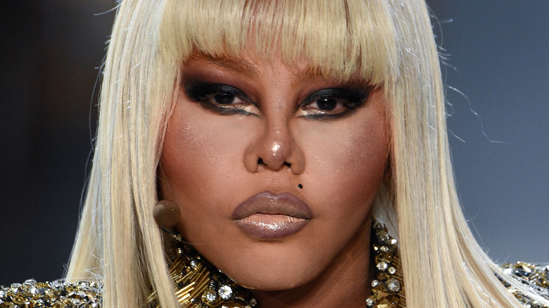 Lil' Kim with blonde hair