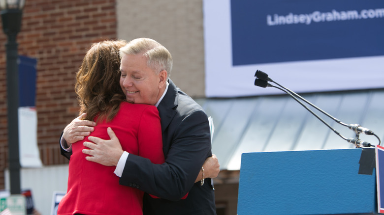 Lindsey Graham hugs Darline onstage after he announced his presidency bid