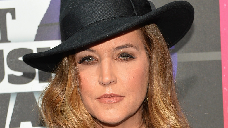 Lisa Marie Presley wearing a fedora