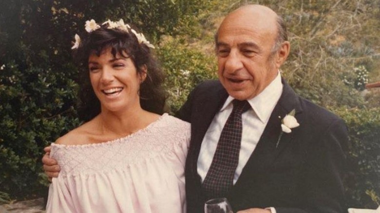 Hilary Farr and her dad smiling, with his arm around her