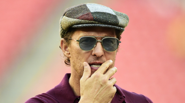 Matthew McConaughey in sunglasses and a hat