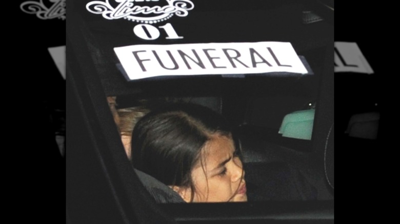 Bigi Jackson crying in a car