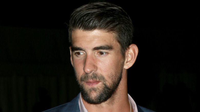 Michael Phelps looking downcast
