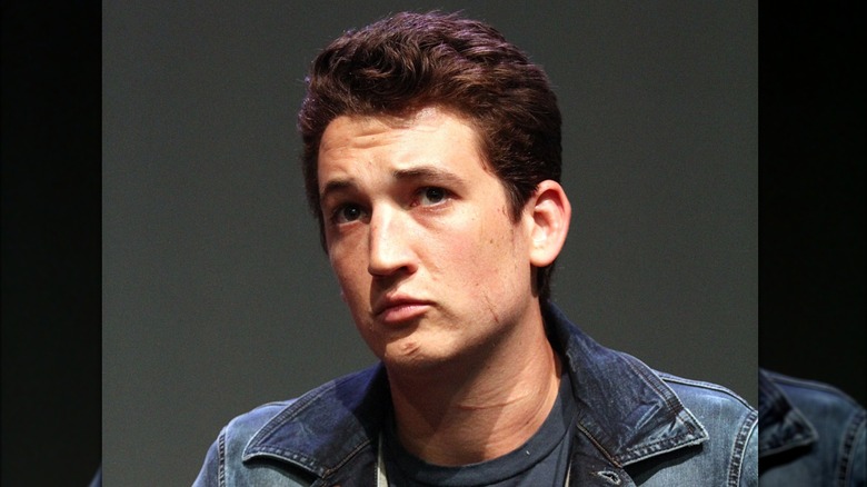 Miles Teller facial neck scars