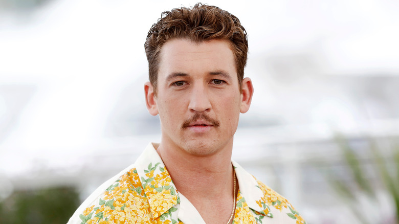 Miles Teller posing