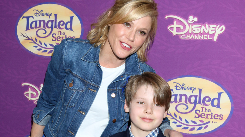 Julie Bowen and son Oliver posing on a red carpet
