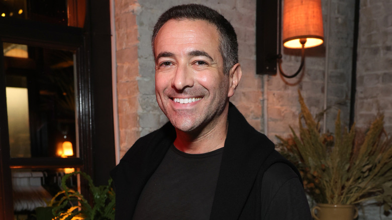 Ari Melber poses at a pre-White House correspondent's dinner party.
