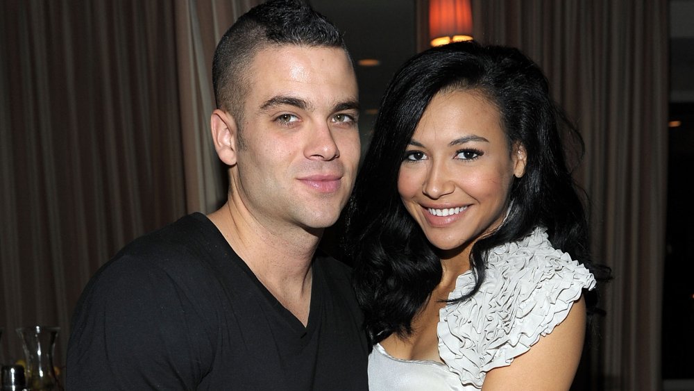 Mark Salling and Naya Rivera hugging at a celebration of Glee's Golden Globe nominations
