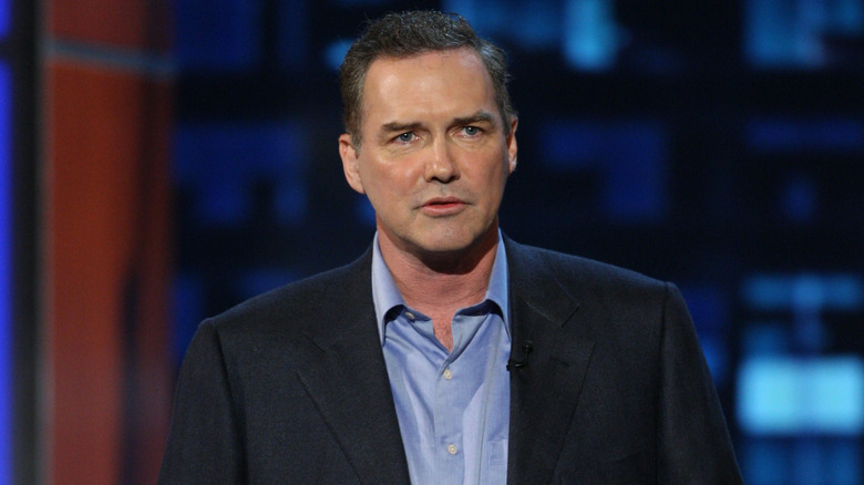 Norm Macdonald looking sad on stage