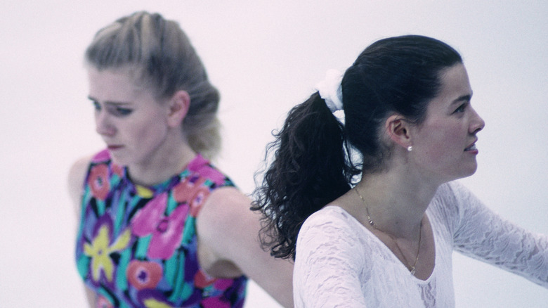 Tonya Harding and Nancy Kerrigan standing on the ice and facing away from each other at 1994 Olympics training session