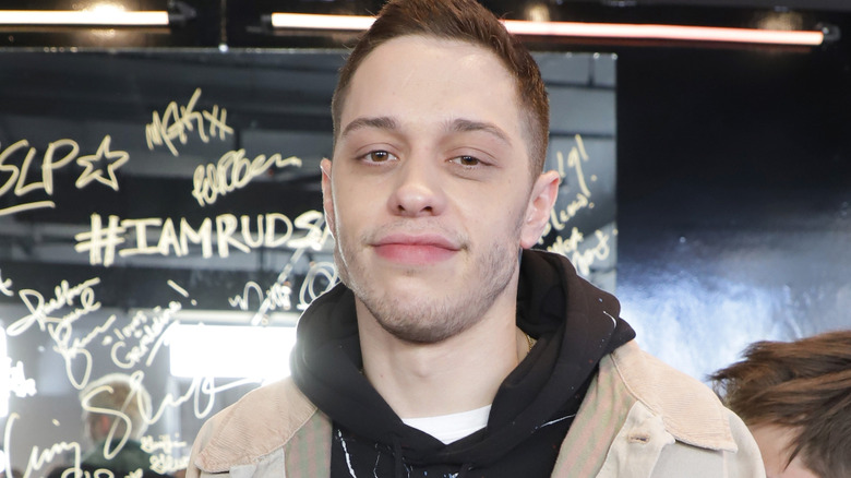 Pete Davidson smiles