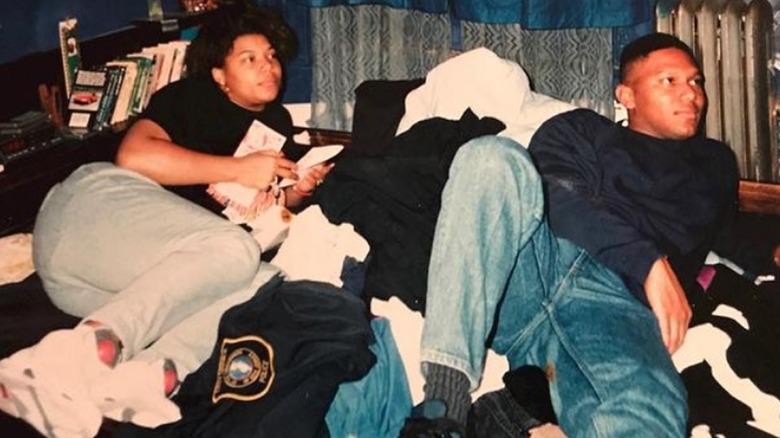 Queen Latifah and her brother smiling 