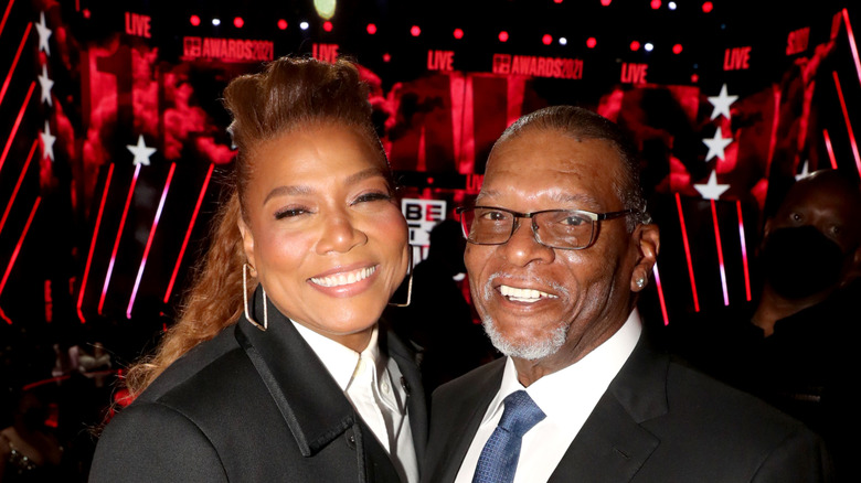 Queen Latifah and her dad smiling