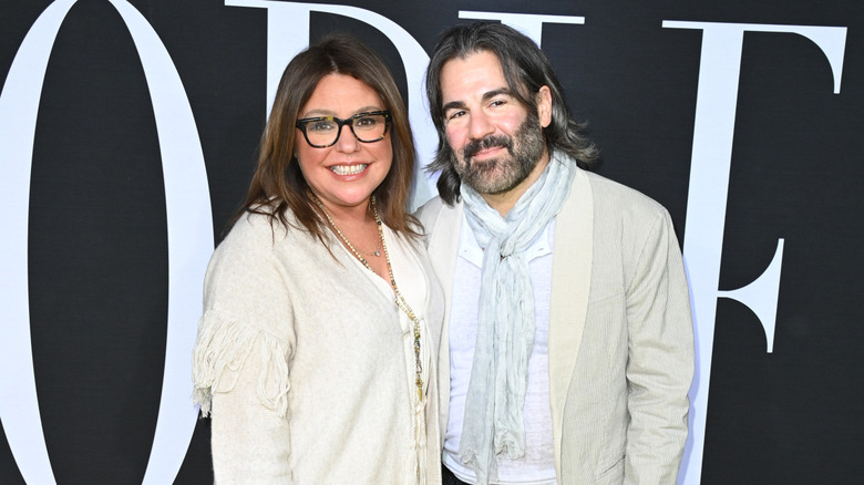 Rachael Ray and John Cusimano pose together at an event.