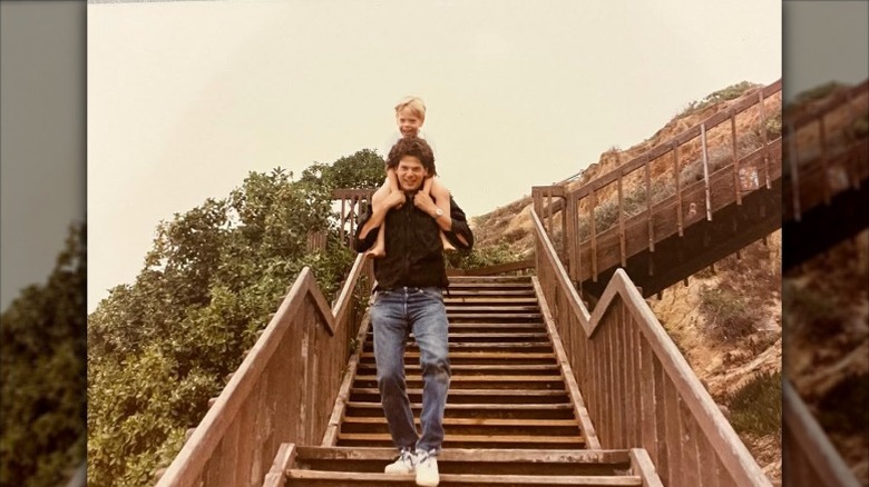Rick Harrison carries young Adam on his shoulders