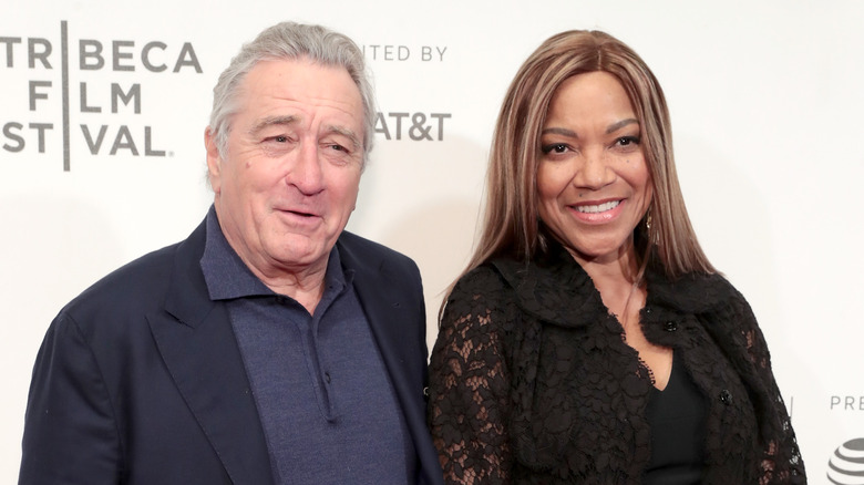 Robert De Niro smiling with Grace Hightower