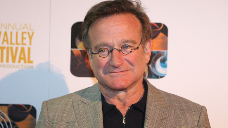 Robin Williams with a small smile