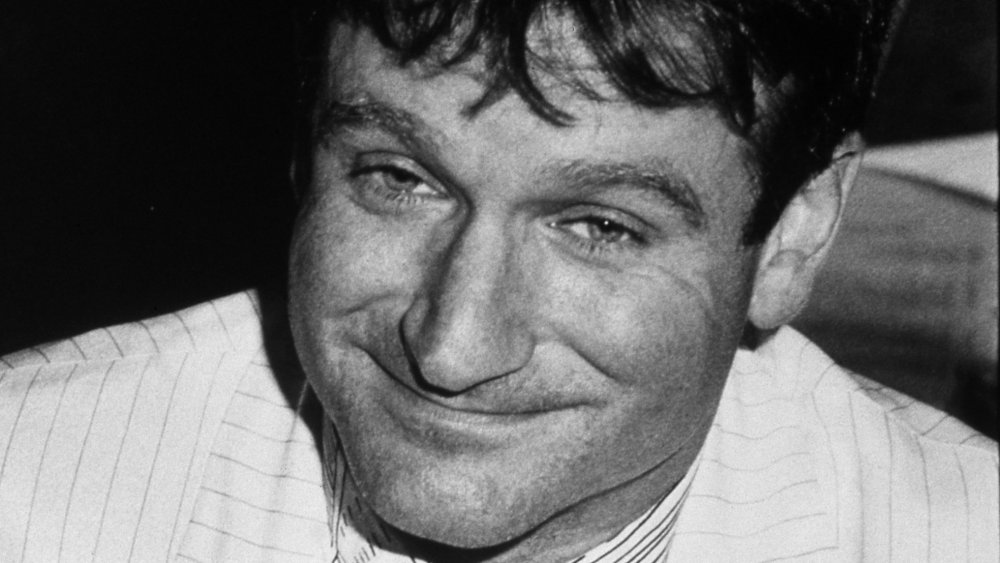 Robin Williams with a sad smile