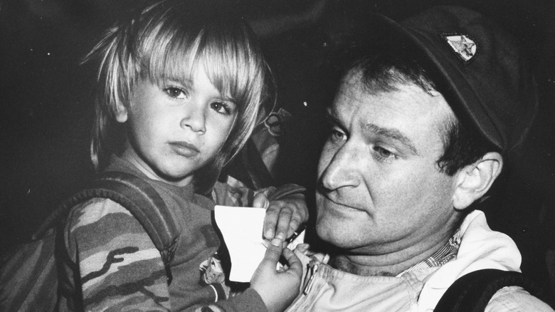 Robin Williams holding his son, Zak Williams