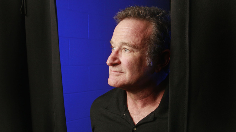 Robin Williams waiting behind the curtain backstage