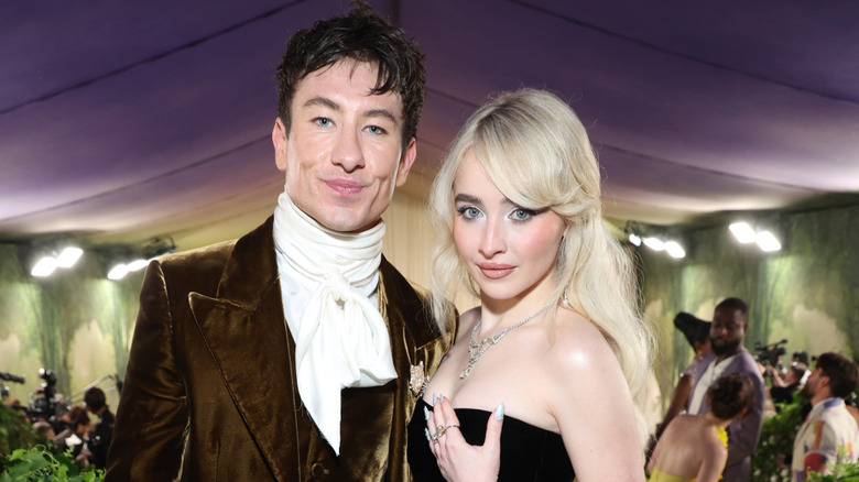 Barry Keoghan and Sabrina Carpenter posing together at The 2024 Met Gala Celebrating "Sleeping Beauties: Reawakening Fashion"