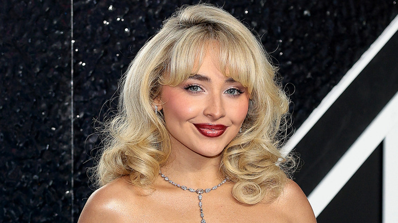 Sabrina Carpenter smiling and posing at 2024 MTV Video Music Awards at UBS Arena